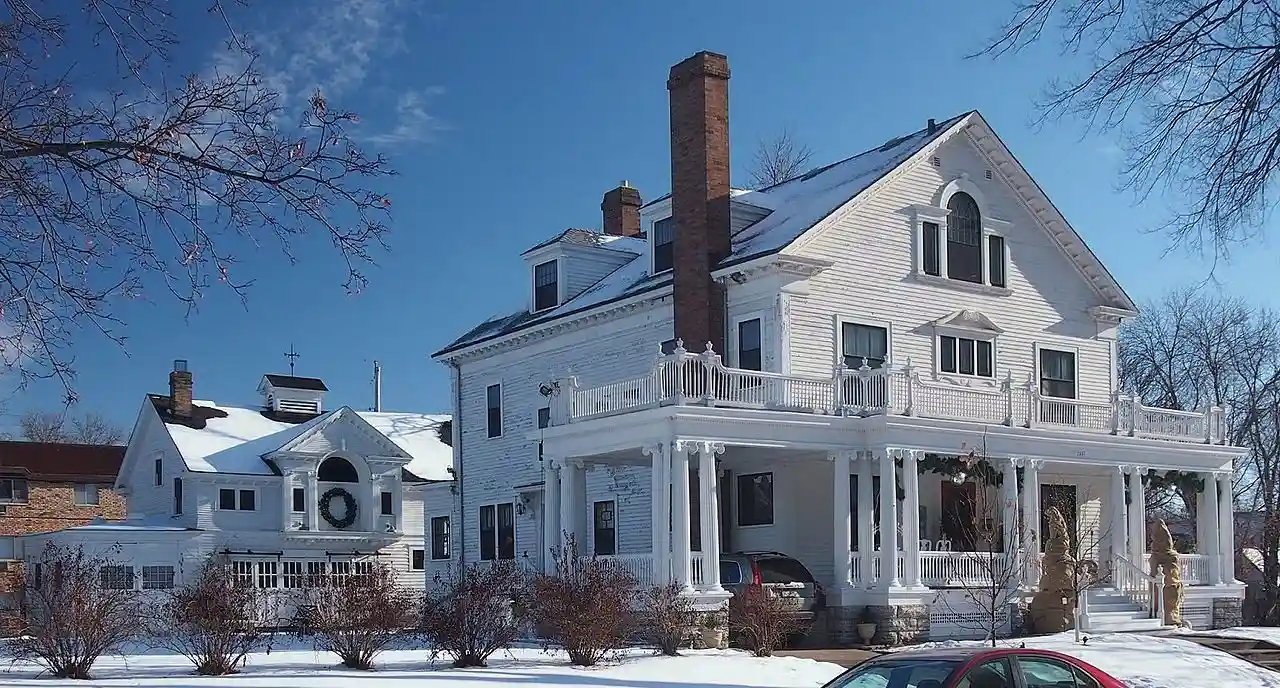John G. and Minnie Gluek House and Carriage House