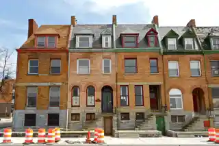 Buildings at 1601–1830 St. Paul Street and 12–20 E. Lafayette Street